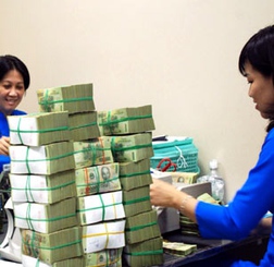 Tiếp cận nguồn vốn của ngân hàng- doanh nghiệp vẫn còn gặp khó khăn