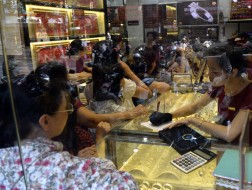 Vàng miếng trong dân - Chìa khóa nâng giá VNĐ