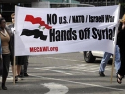 Ngày 8/9 tại bang Michigan (Mỹ), một nhóm biểu tình phản đối Mỹ can dự vào Syria. Ảnh: Detroit News.