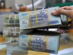 Giảm trần lãi suất huy động VND xuống 6,5%/năm, huy động USD xuống 1,25%/năm