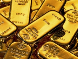 Giá vàng rớt xuống 1.407 USD/ounce