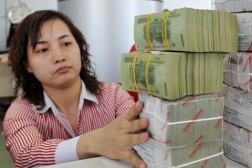 Còn khoảng 450.000 tỉ đồng dư nợ với lãi suất trên 13%/năm