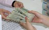Lộ chiêu lách luật vượt trần lãi suất tiết kiệm USD 0%