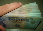 Giữ tiền đồng hay ngoại tệ ?