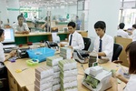 Nhân viên nhiều ngân hàng mất việc trong quý 1/2013